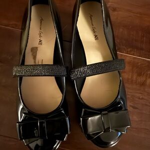 American Eagle Outfitters Glossy Black Bow wedge heel